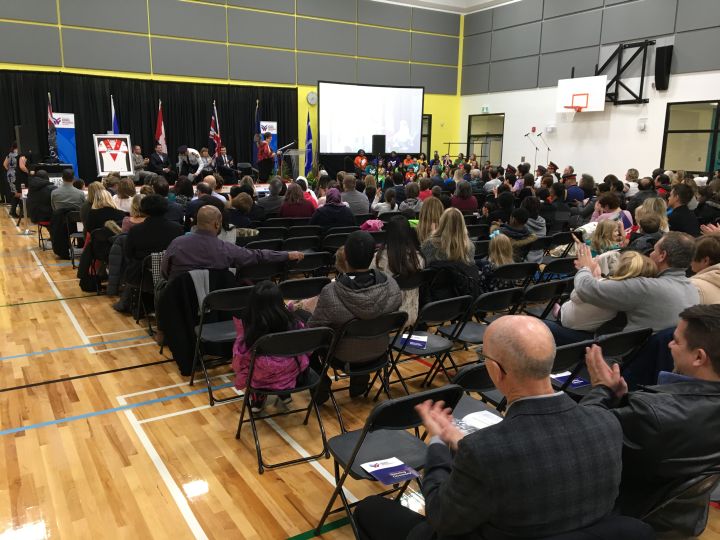 Classes already started more than two months ago at Edmonton’s Constable Daniel Woodall School but on Wednesday, family and friends of the fallen police officer whose name the school bears were joined by dignitaries and students to celebrate its official opening.