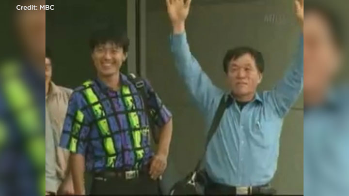 Taegun Kim (left) on South Korean TV in 2002. He thinks that this appearance led to his parents being tortured and killed by the North Korean authorities.