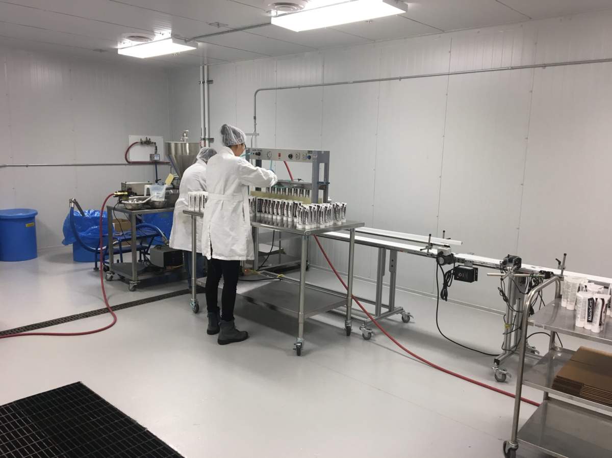 Staff at EC Labs private label manufacturer, founded by Eveline Charles, creating custom haircare, beauty and personal care products at their lab in Edmonton, Alta. November 2, 2017.