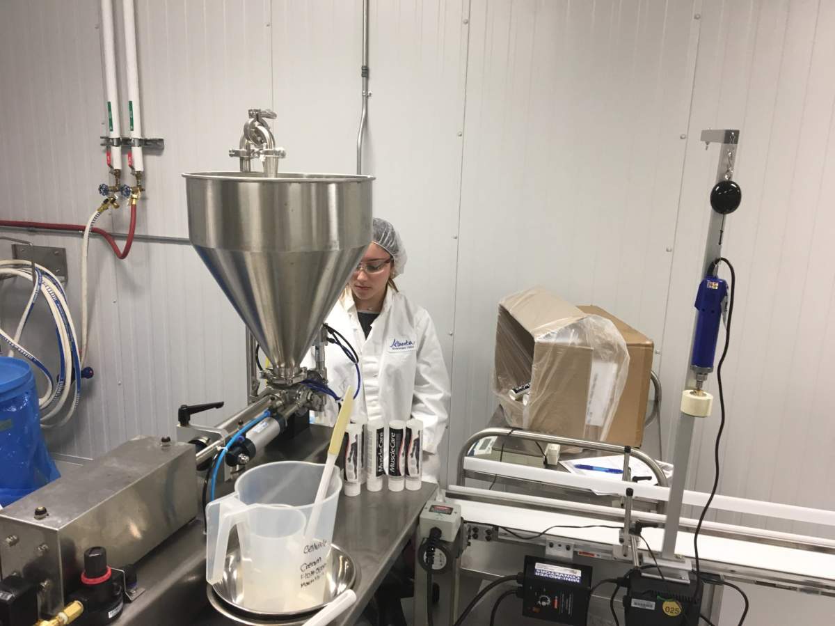 Staff at EC Labs private label manufacturer, founded by Eveline Charles, creating custom haircare, beauty and personal care products at their lab in Edmonton, Alta. November 2, 2017.