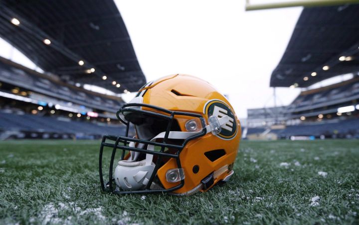 A helmet belonging to a Edmonton Eskimos player is seen on the field during a team practice session in Winnipeg on Wednesday, Nov. 25, 2015. 