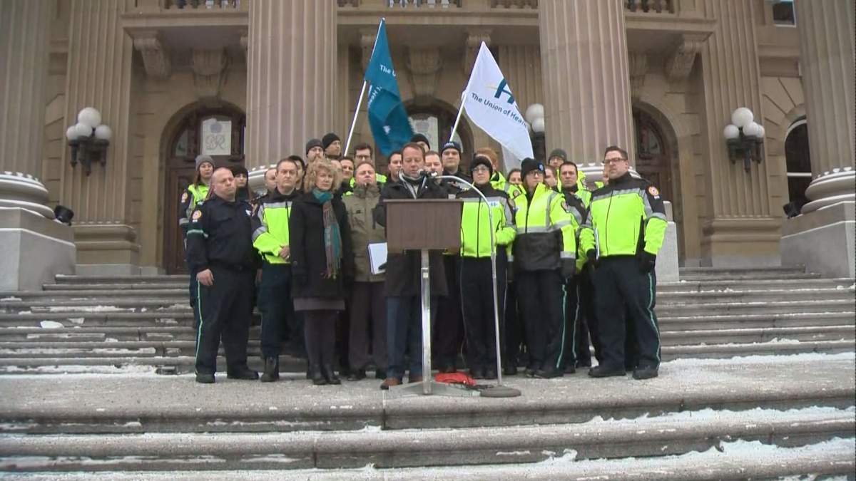 A group of paramedics rally at the Alberta legislature on Nov. 15, 2017.