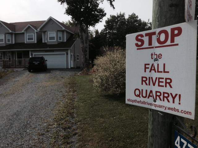 FILE - A sign protesting the Fall River quarry. On Friday, Nova Scotia announced it had dismissed three appeals against the project.