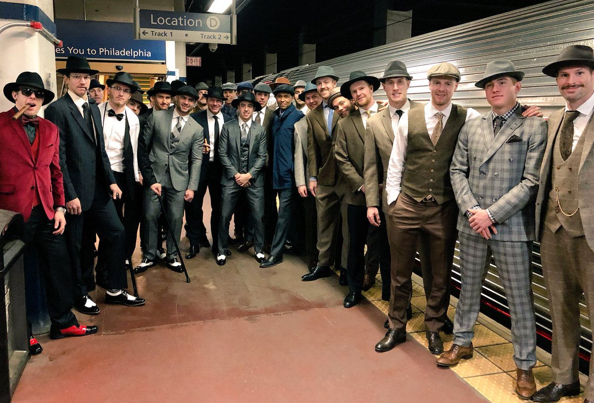 Members of the Calgary Flames ready to board a train for a 1950s themed ride to Washington D.C. 