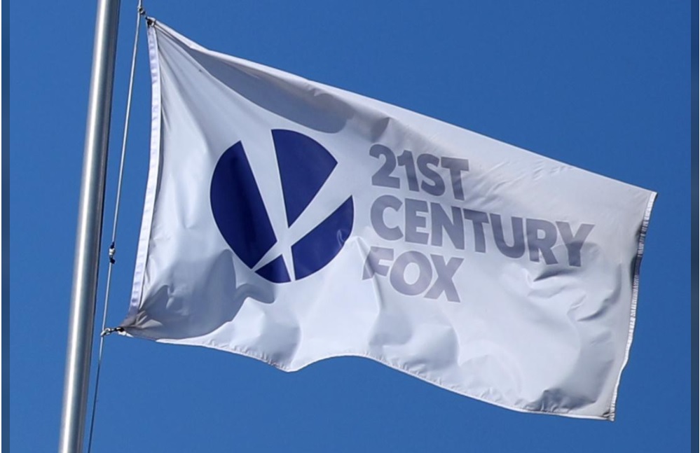 The Twenty-First Century Fox Studios flag flies over the company building in Los Angeles, California Nov. 6 2017.