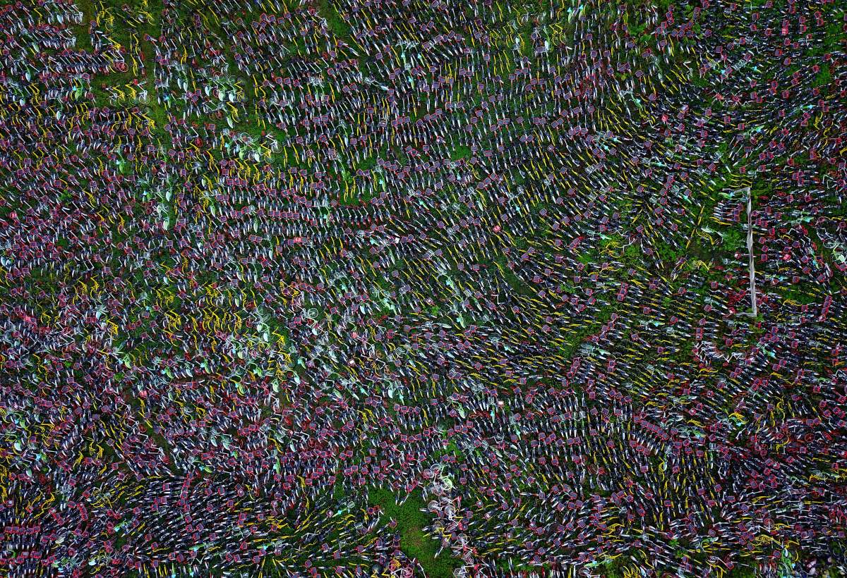 Tens of thousands of rental bikes parked at spots causing trouble to pedestrians and traffic in streets have been removed away by government authorities to the graveyards of the bikes while bike companies struggle to regulate the parking behaviour of users. (Feature China/Barcroft Images/Barcroft Media via Getty Images)