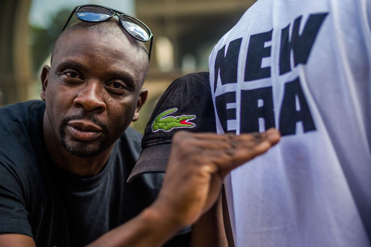 A delegate of ruling ZANU-PF party reacts upon the annoucement of the party’s president dismissal on November 19, 2017 in Harare. (JEKESAI NJIKIZANA/AFP/Getty Images)