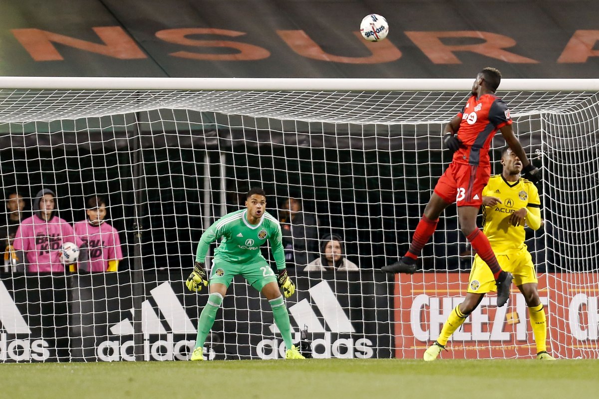Chris Mavinga #23 of the Toronto FC heads the ball wide of the goal and goalkeeper Zack Steffen #23 of the Columbus Crew SC during the first half at MAPFRE Stadium on November 21, 2017 in Columbus, Ohio. 