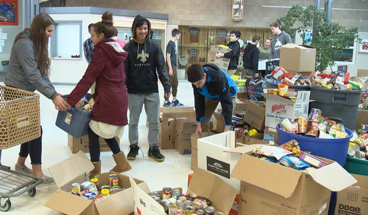 St. Joseph High School students collected over 21,000 pounds of food in the eight annual Halloween for Hunger fundraiser.