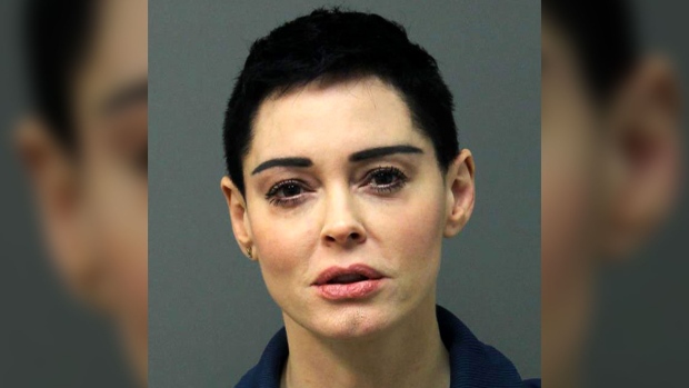 This image released Tuesday, Nov. 14, 2017 by the Loudoun County Sheriff's Office shows the booking photo for actress Rose McGowan who surrendered to Airports Authority Police on charges of possession of a controlled substance.