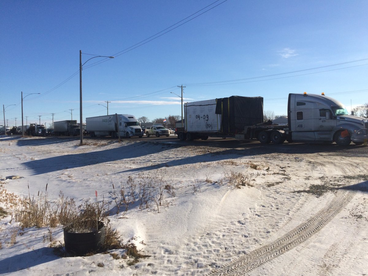 Traffic was backed up on Highway #1 west of Winnipeg Friday as emergency crews attended to a fatal crash.