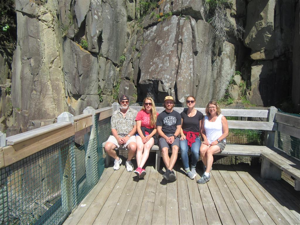 Wyatt Evans, his wife Anita and their three children pose for a photo at the Balancing Rock in Digby, N.S. during their vacation this past June. Wyatt died in August after battling non-Hodgkin lymphoma.  The family lost their camera on that trip to the East Coast and are appealing to anyone who comes across it to return the memories.
