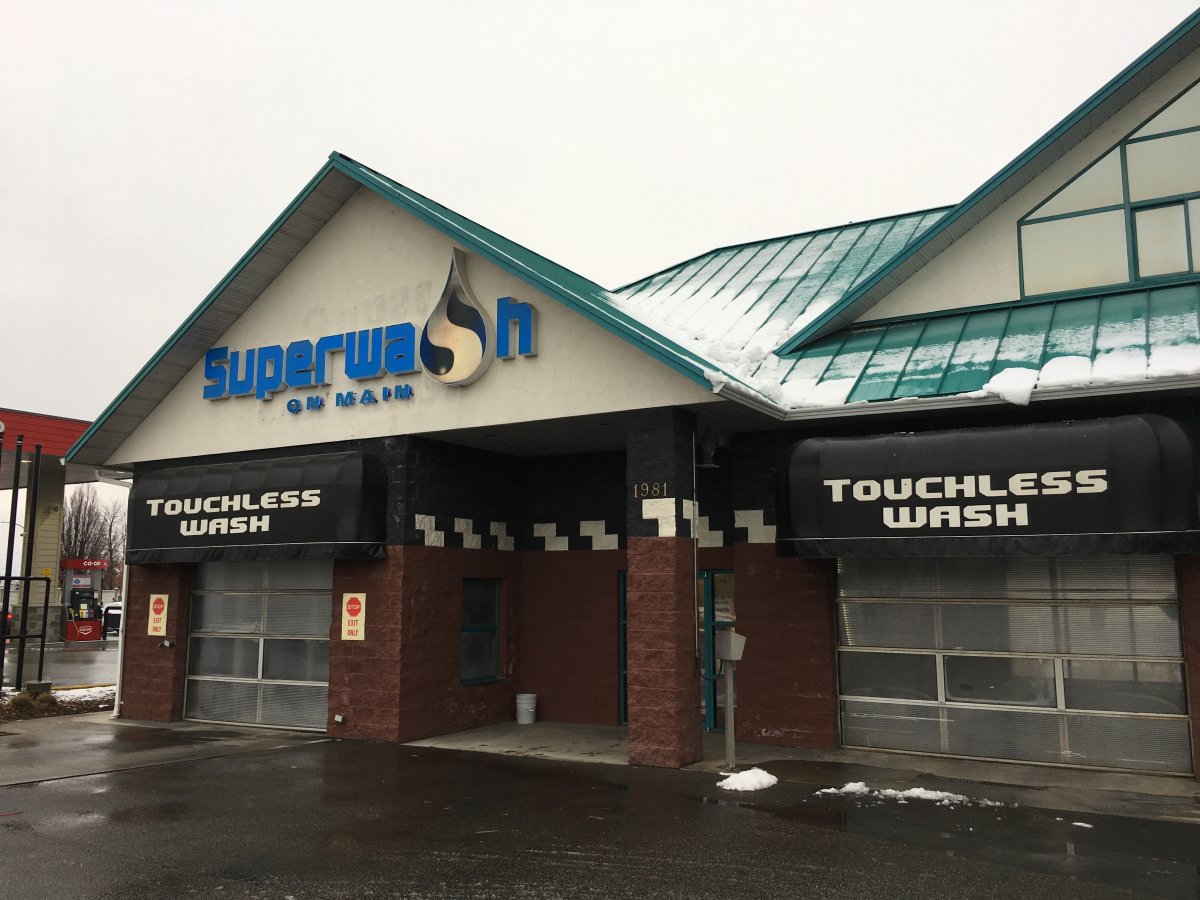 An employee has died after falling from a height at a Penticton car wash.