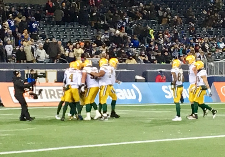 The Edmonton Eskimos celebrate a touchdown against the Winnipeg Blue Bombers during the CFL Western Semifinal at Investors Group Field.