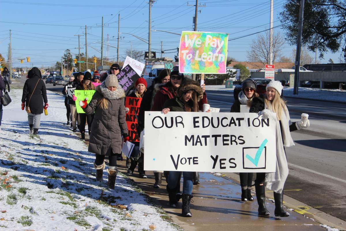 A few dozen frustrated students attended a march Friday afternoon, urging teachers to say yes during next week’s vote.