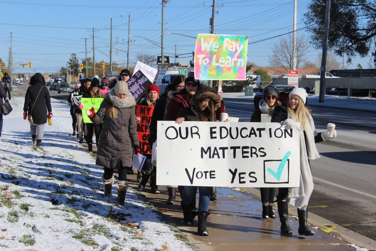A few dozen frustrated students attended a march Friday afternoon, urging teachers to vote yes during next week's vote.