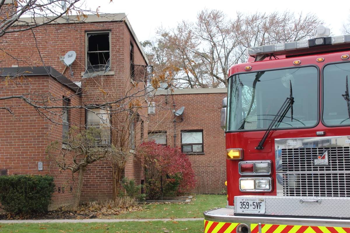 Broken windows can be seen on this second floor unit of Maple Village, a 45-unit supportive housing facility on Hamilton Rd. 