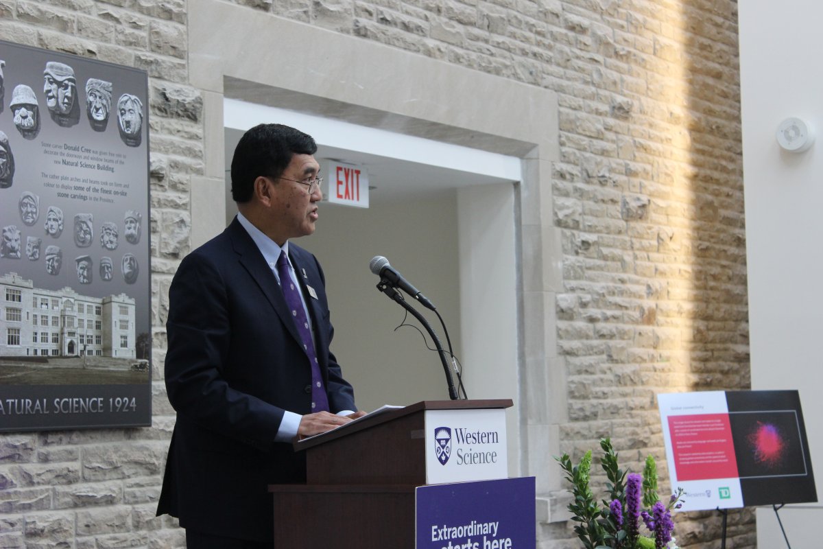 Amit Chakma, the president of Western University, announces a $1 million gift from TD Bank.