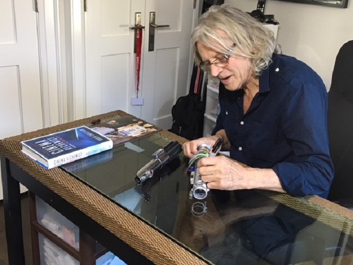 Academy Award designer and filmmaker Roger Christian prepares the package to send to Jacob Thompson