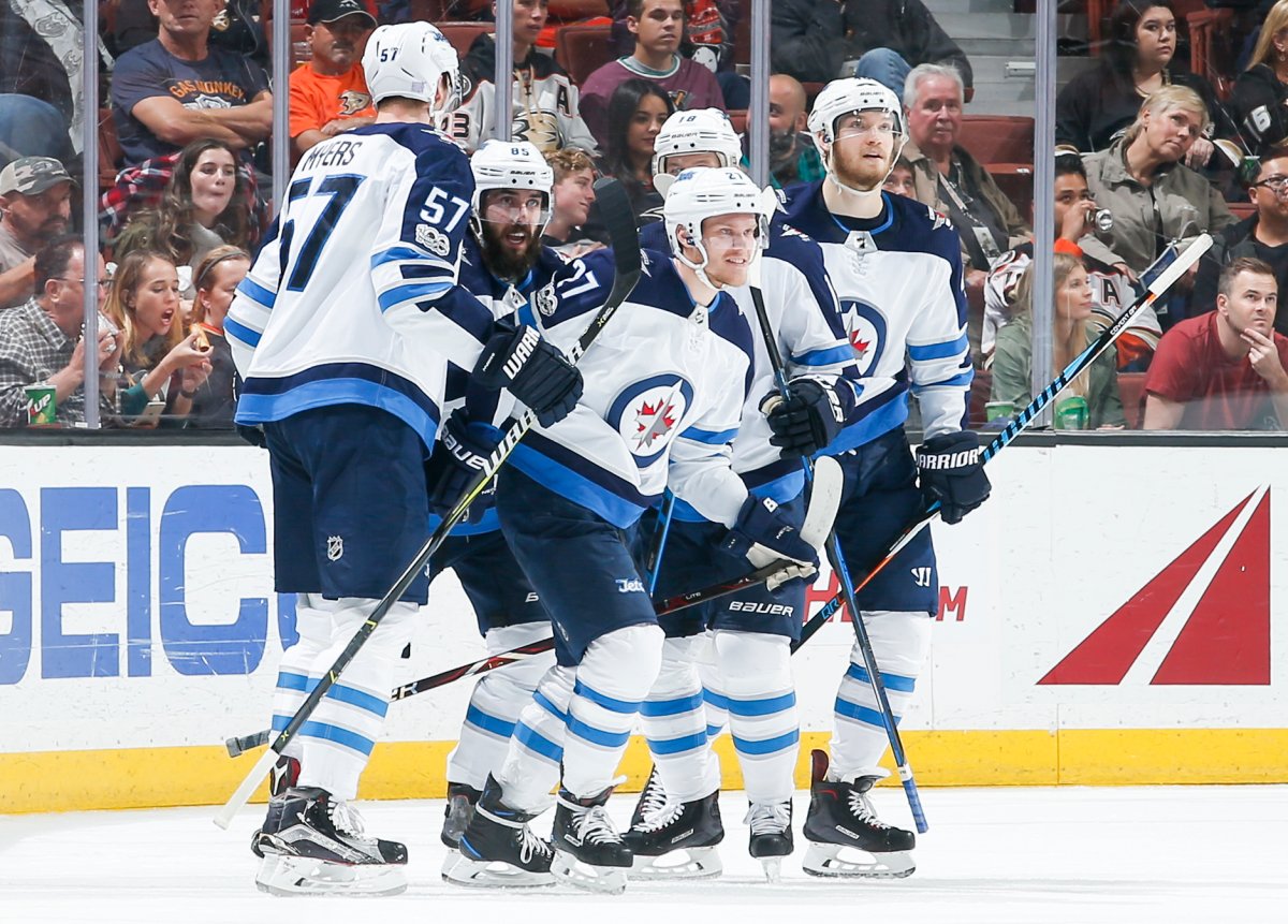 ANAHEIM, CA - NOVEMBER 24: Nikolaj Ehlers #27 of the Winnipeg Jets celebrates his second first-period goal with Tyler Myers #57, Mathieu Perreault #85, Bryan Little #18, and Joel Armia #40 during the game against the Anaheim Ducks at Honda Center on November 24, 2017 in Anaheim, California. (Photo by Debora Robinson/NHLI via Getty Images).