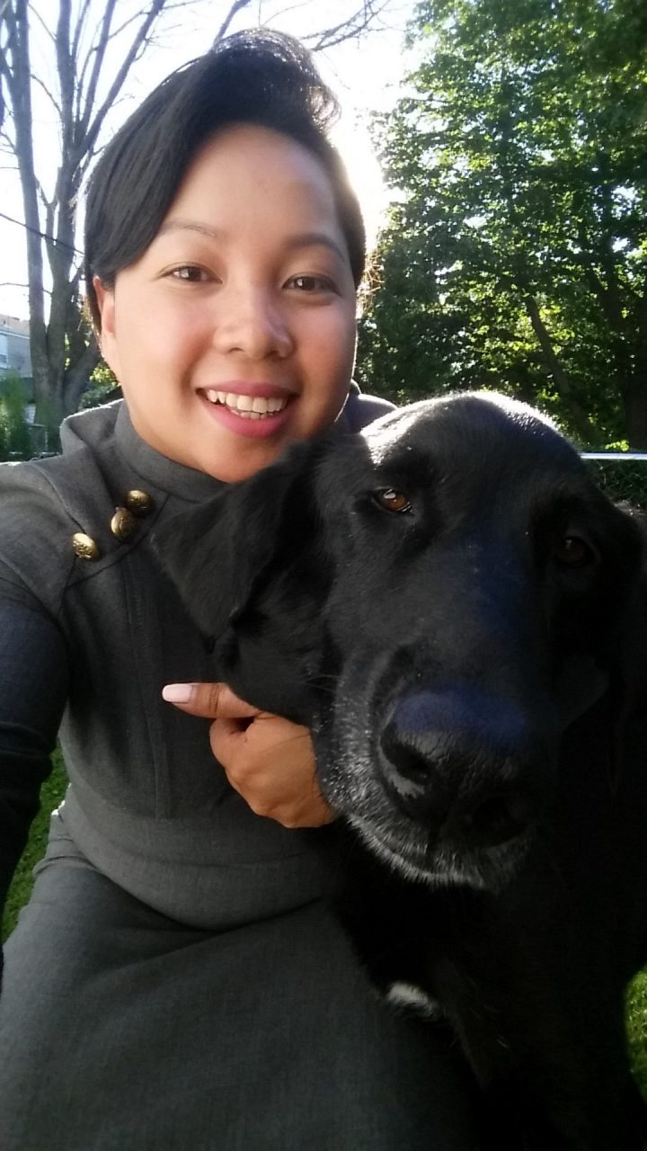 Joy Olayta with her dog.