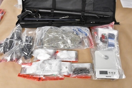 London police say they executed a search warrant at a home on King Street on Wednesday and allegedly found more than $6,700 in drugs as well as a spear gun, brass knuckles and two pellet pistols.
