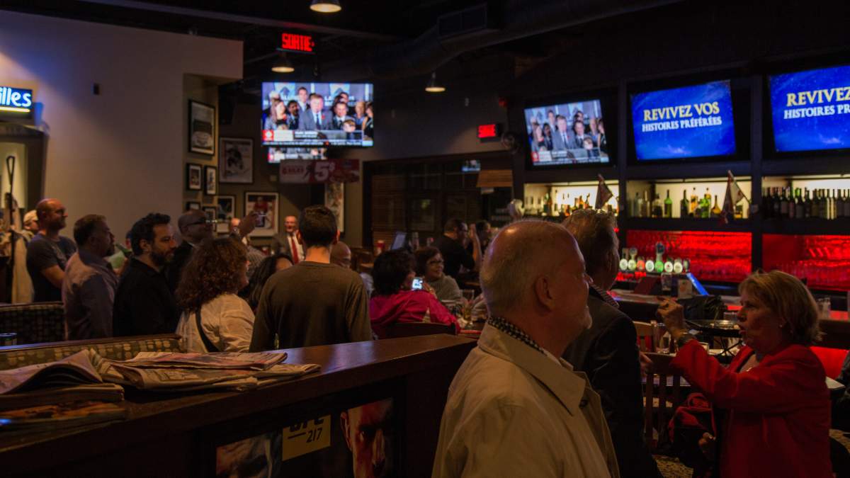 Doreen Assaad supporters celebrate a grand victory at Boston Pizza in Brossard during the 2017 municipal elections, Sunday, Nov. 5, 2017.