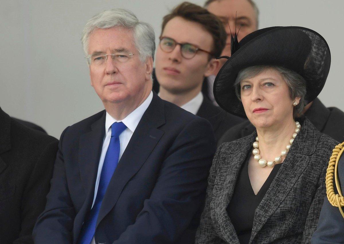 British Prime Minister Theresa May, and Secretary of State for Defence Michael Fallon attend the unveiling of the new memorial to members of the armed services who served and died in the wars in Iraq and Afghanistan at Victoria Embankment Gardens on March 8, 2017 in London, England. 