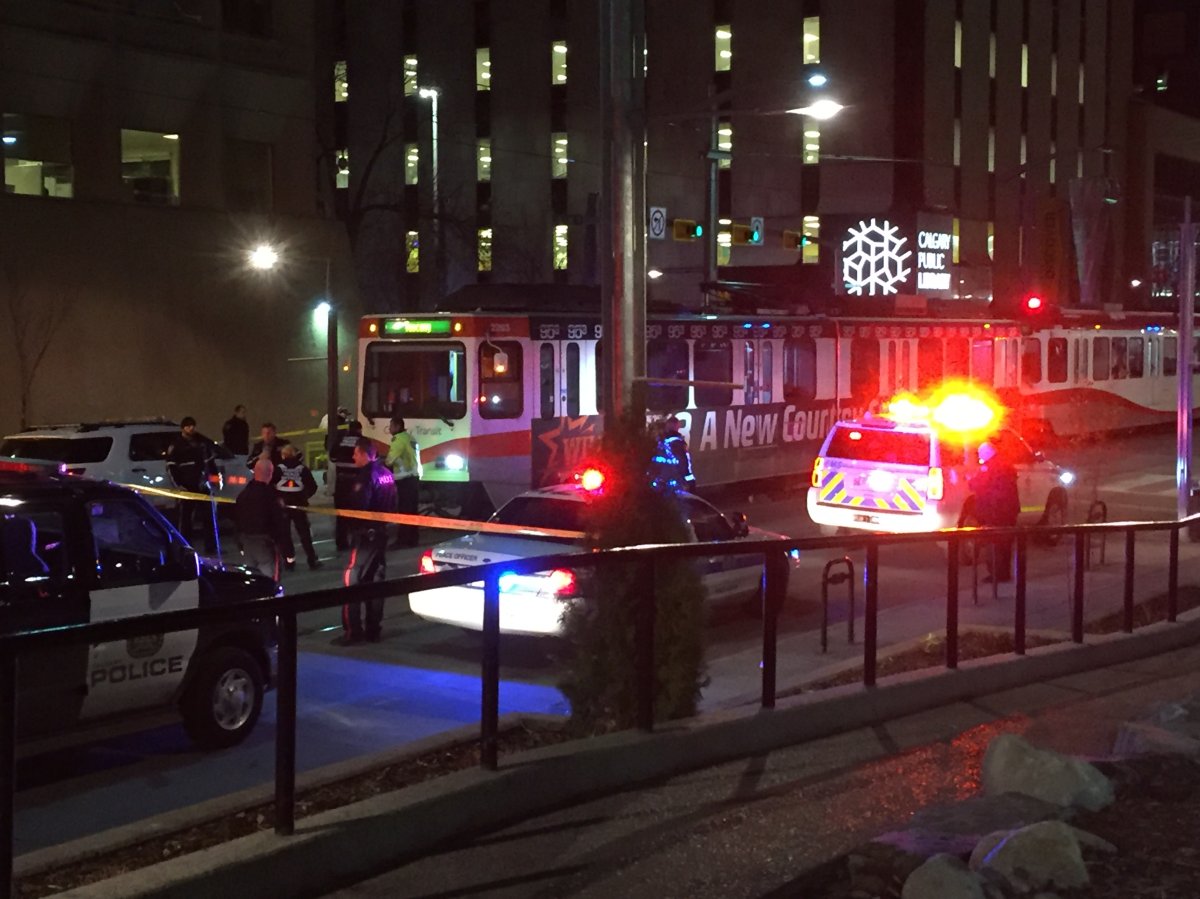 Emergency crews at the scene of an incident where a person was hit by a CTrain Saturday. 