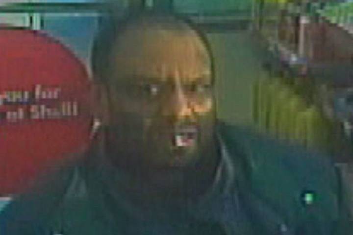Securtiy image of the man who allegedly stole a poppy donation box in North York on Remembrance Day.