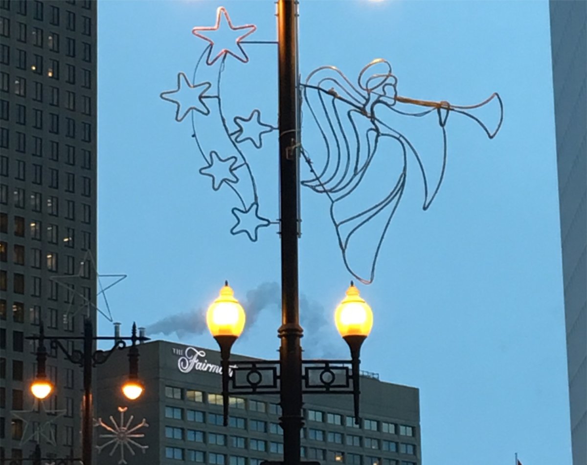 Festive lights are ready and waiting on streetlamps on Portage Avenue.