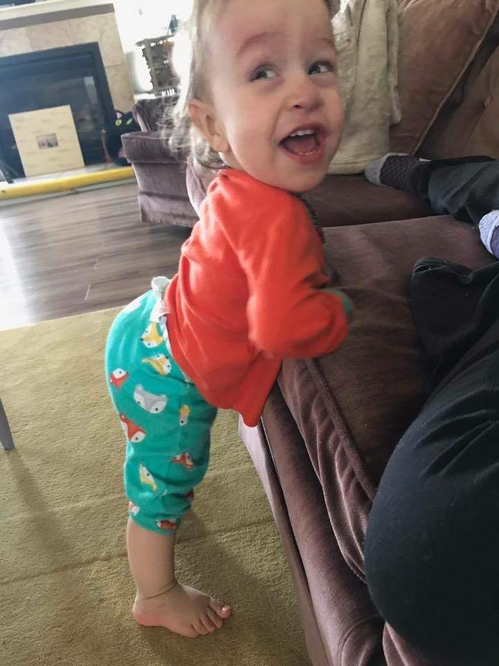 FILE: Then-toddler Rossy Hipkin pulls himself up on the couch. Nov. 13, 2017.