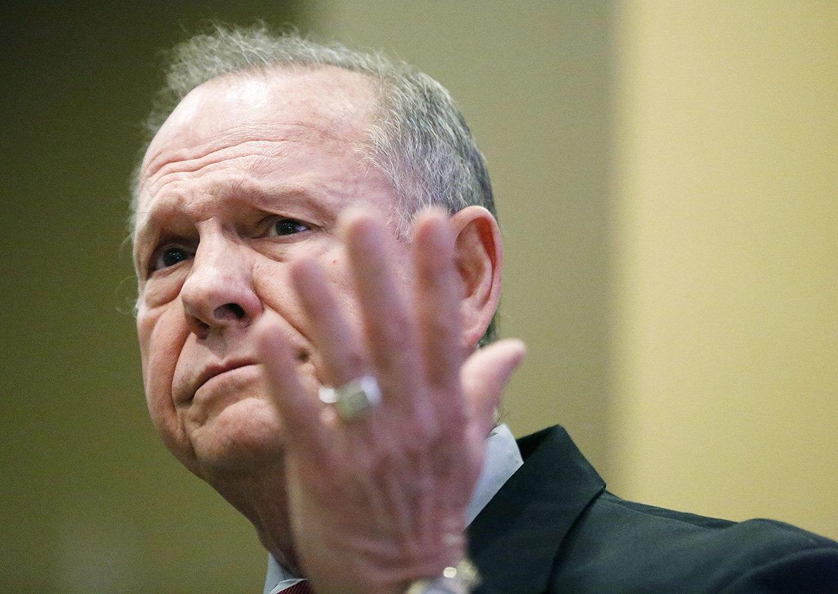 Roy Moore speaks at the Vestavia Hills Public library, Saturday, Nov. 11, 2017, in Birmingham, Ala.