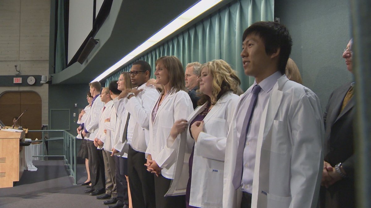 Medical students graduating to become doctors in Winnipeg. 