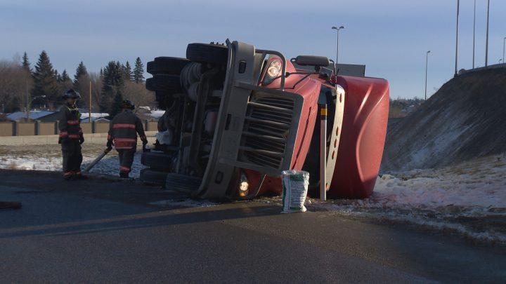 A semi-truck and trailer that was hauling flour flipped on its side near the Lorne Avenue exit on Wednesday.