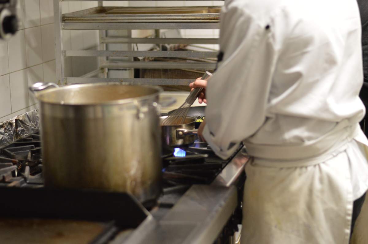 A Calgary restaurant owner says she's expecting the carbon tax and minimum wage hikes will be another blow to her bottom line.