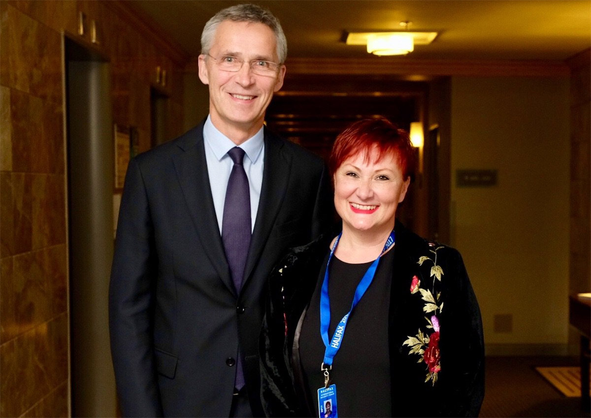 Jens Stoltenberg and Clare Hutchinson.
