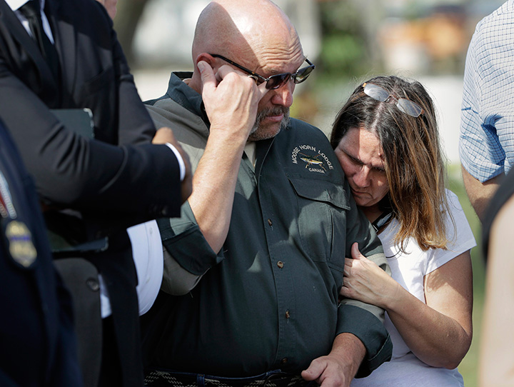 Pastor Frank Pomeroy and his wife Sherri join a news conference near the First Baptist Church of Sutherland Springs, Monday, Nov. 6, 2017, in Sutherland Springs, Texas.