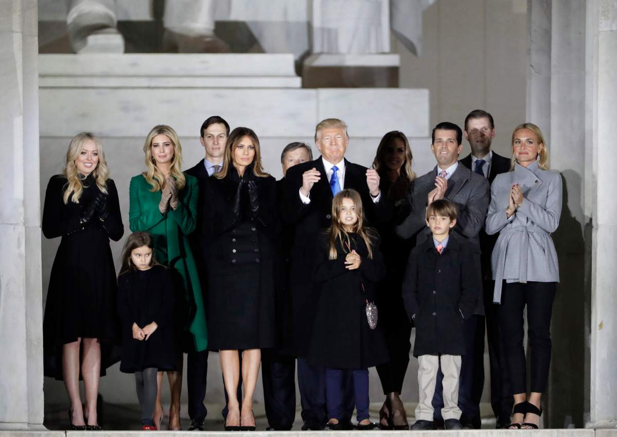 In this Jan. 19, 2017, file photo, then-President-elect Donald Trump and his wife Melania Trump and family wave at the conclusion of the pre-Inaugural "Make America Great Again! Welcome Celebration" at the Lincoln Memorial in Washington.