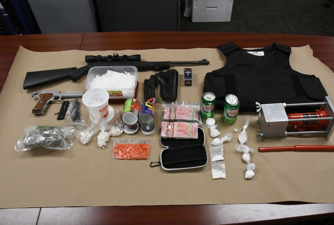 London police say they executed a search warrant at a home on Waterloo Street on Thursday and seized more than $109,000 in drugs. Two people face charges in the case.