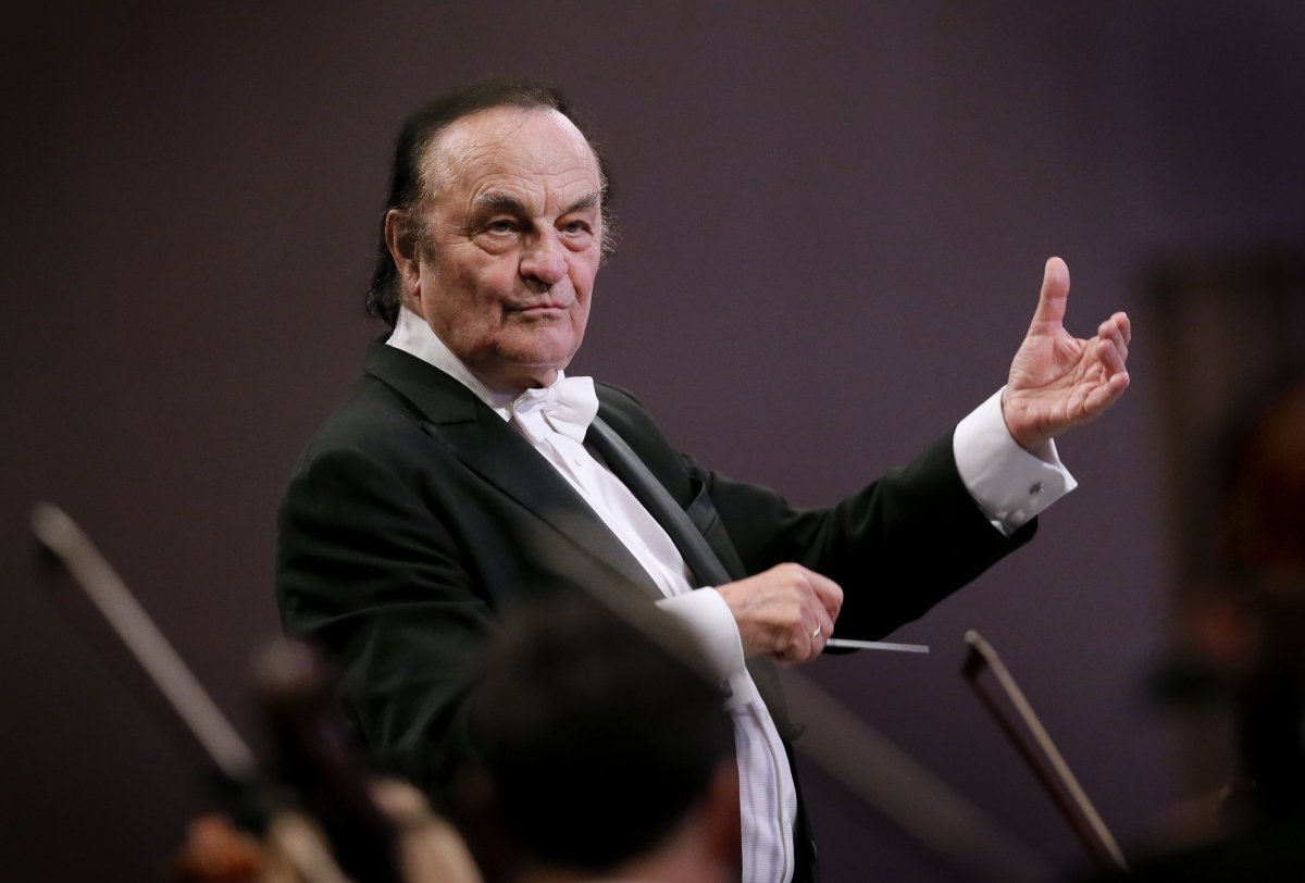 In this file photo, Swiss conductor Charles Dutoit directs the Royal Philharmonic Orchestra while performing George Enescu's Romanian Rhapsody no. 1 in A major op. 11 no.1 the at Grand Palace Concert Hall during the George Enescu International Festival in Bucharest, Romania, late 12 September 2017.