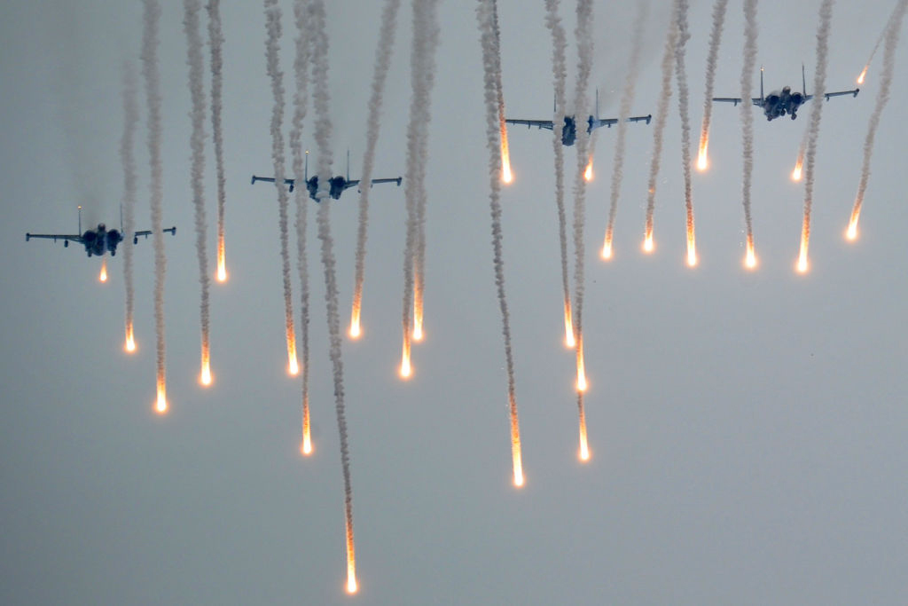 Military jets fly during the joint Russian-Belarusian military exercises Zapad-2017  at a training ground near the town of Borisov on September 20, 2017.