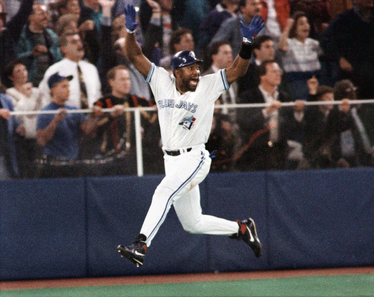 FILE - In this Oct. 23, 1993, file photo, Toronto Blue Jays' Joe Carter celebrates his game winning three-run home run in the ninth inning of Game 6 of the World Series against the Philadelphia Phillies in Toronto. (AP Photo/Mark Duncan, File).
