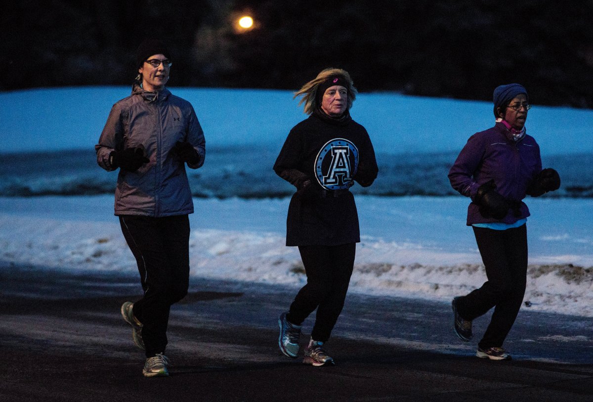Alberta Premier Rachel Notley goes for a morning run wearing a Toronto Argonauts jersey after losing a bet on the Grey Cup to Ontario Premier Kathleen Wynne in Edmonton Alta, on Friday December 1, 2017. 