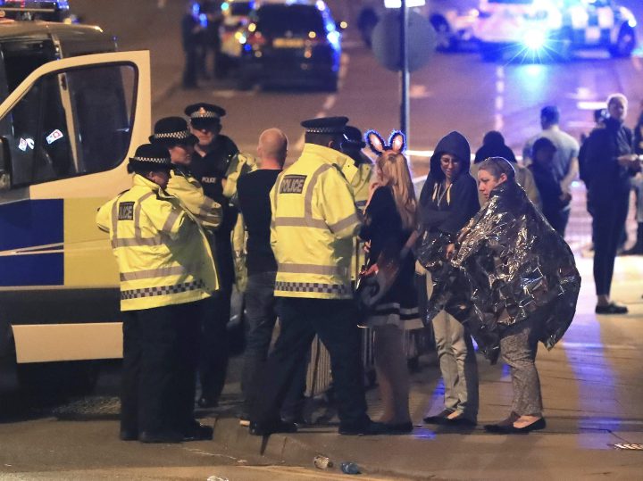 This is a May 23 file photo of members of the  emergency services  attending the scene at Manchester Arena after reports of an explosion at the venue during an Ariana Grande concert.