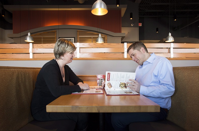 Conservative Leader Andrew Scheer, right, looks over a menu with his wife Jill at a restaurant in Ottawa on Monday December 11, 2017. The line of separation between politics and home life for the Scheers is set to get a little less sharp in 2018 as the Conservatives move to position Andrew as the next best leader for the country. 