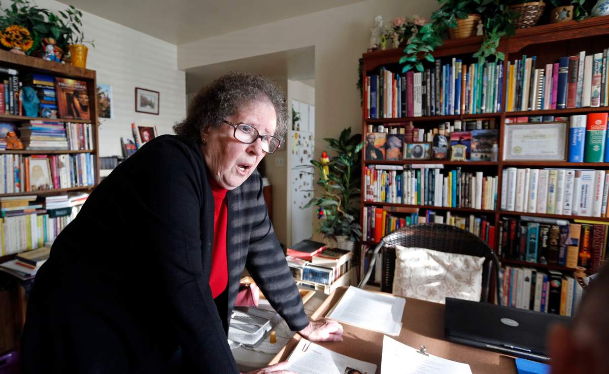 In this Monday, Nov. 6, 2017, photo, show Helen Radkey at her home in Holladay, Utah. Mormons are posthumously baptizing Holocaust victims as well as grandparents of public figures like Donald Trump, Hillary Clinton and Steven Spielberg.