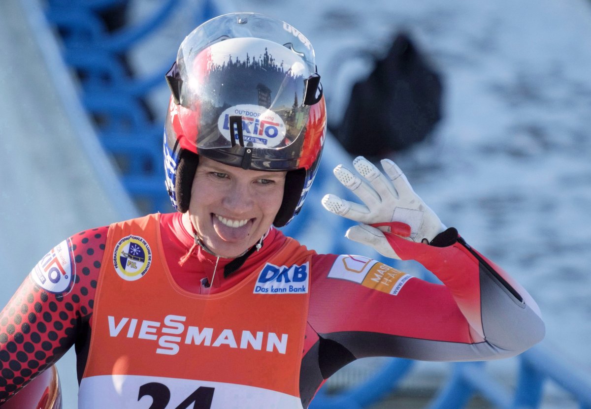 Canada's Alex Gough, celebrates her second place finish in the women's World Cup luge competition in Calgary on December 9, 2017. Alex Gough of Calgary leads Canada's eight lugers into the 2018 Winter Games in Pyeongchang, South Korea, where the country seeks its first Olympic medal in the sport. Gough is Canada's most decorated luge athlete with 25 World Cup medals two world championship bronze in women's singles.