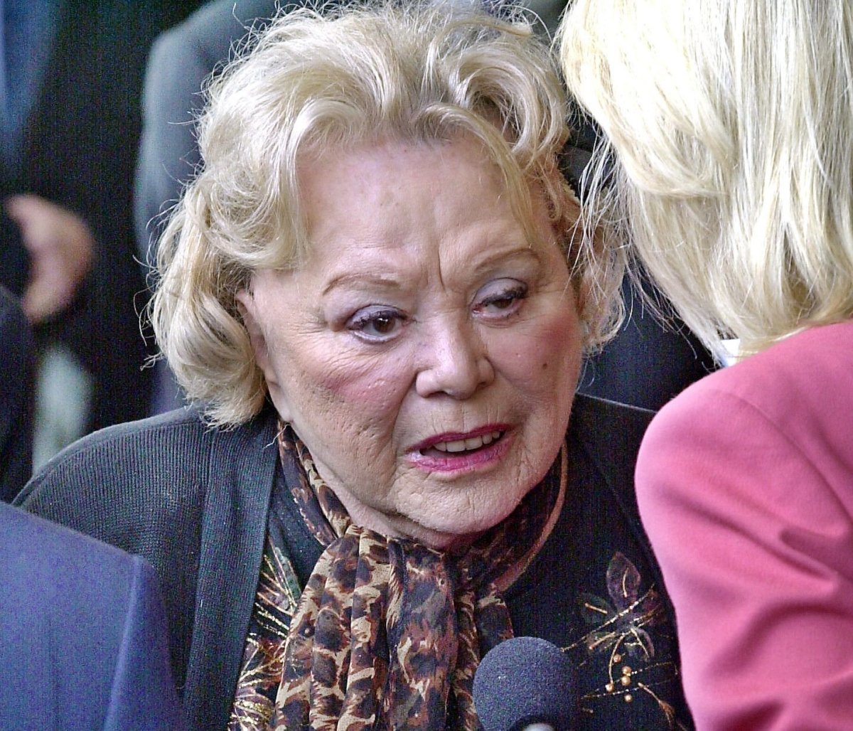 Actress and comedian Rose Marie talks to the press in April 2002 as she arrives for a ceremony honouring comedian Milton Berle at Hillside Memorial Park and Mortuary in Los Angeles.