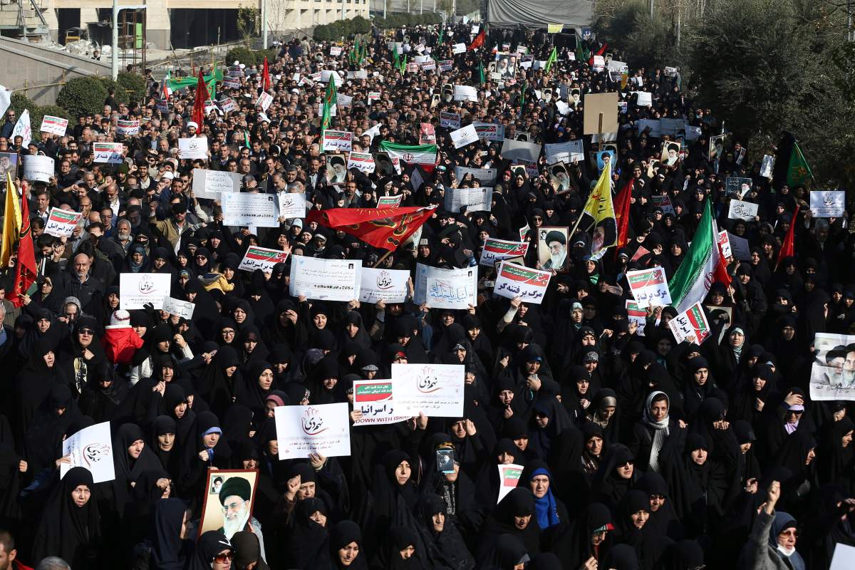 Iranian protesters chant slogans at a rally in Tehran, Iran, Saturday, Dec. 30, 2017. Iranian hard-liners rallied Saturday to support the country’s supreme leader and clerically overseen government as spontaneous protests sparked by anger over the country’s ailing economy roiled major cities in the Islamic Republic.
